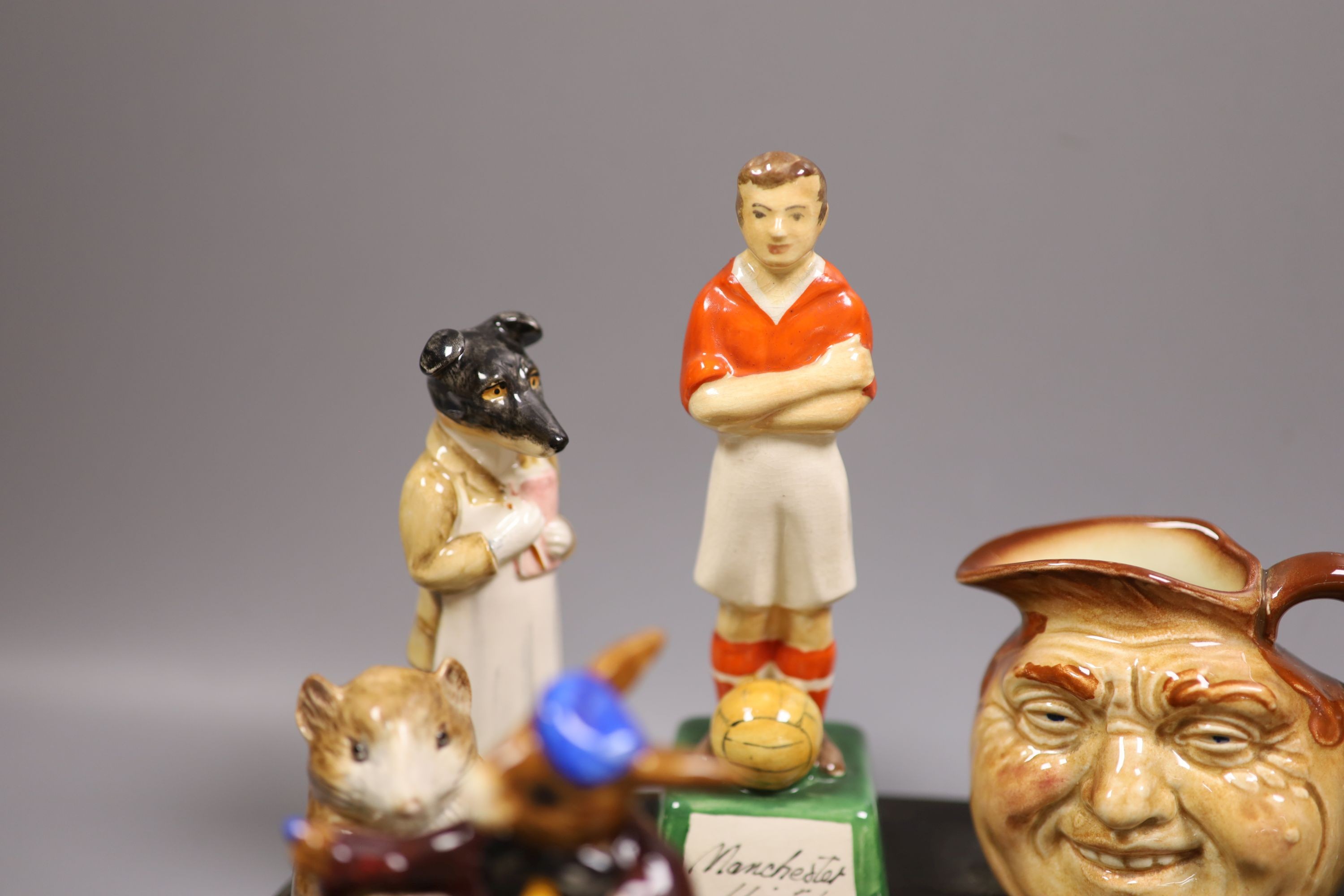 A collection of Royal Doulton miniature character mugs, figurines, series plate etc